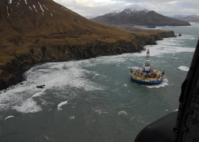 Two life rafts sit on the beach adjacent to Royal Dutch Shell's conical drilling unit Kulluk, 40 miles southwest of Kodiak City, Alaska, Jan. 3, 2013. The Kulluk was grounded after efforts by U.S. Coast Guard and tug vessel crews to move the vessel to a safe harbor during a winter storm during a tow from Dutch Harbor, Alaska, to Everett, Wash. (DoD photo by Petty Officer 2nd Class Zachary Painter, U.S. Coast Guard/Released)