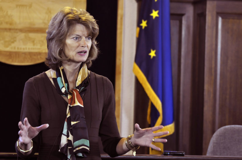 Sen. Lisa Murkowski talks with reporters during a press availability following her annual address to the legislature, Feb. 19 2014. (Photo by Skip Gray/Gavel Alaska)