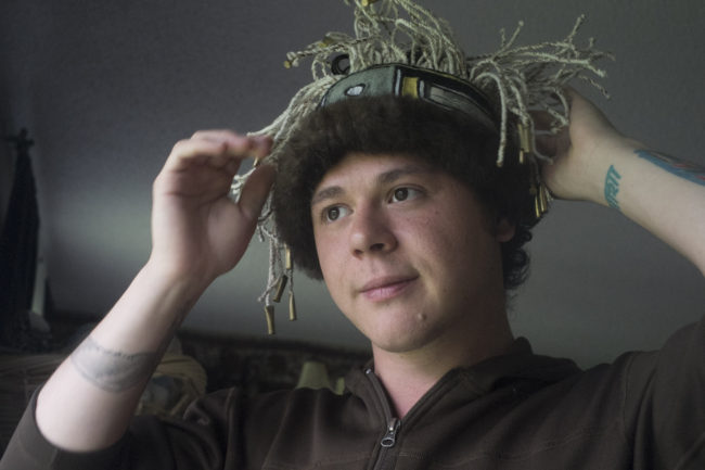 A man wears a Chilkat headband