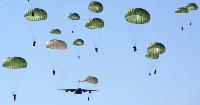 An Air Force C-17 airdrops about 60 Army paratroopers into JBER's Malemute Drop Zone. (U.S. Air Force photo by Justin Connaher)
