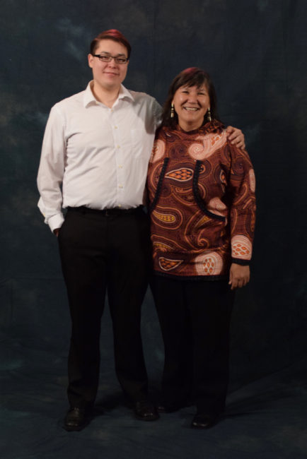 Jacob Taug and his aunt, Valerie Davidson, who said, "I almost always wear kuspuks. They’re very comfortable. They remind me of my grandmother."  (Photo by Skip Gray/KTOO)