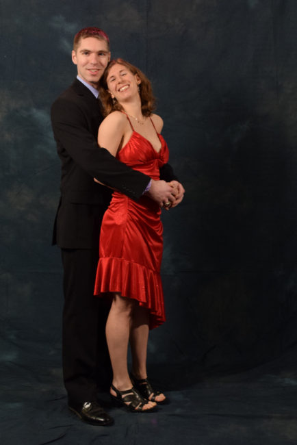 James and Crystal Dooley.  "I bought this dress in 2007," said Crystal. "He and I went to the Coast Guard academy together and we had a formal dance at a Newport castle. We were boyfriend and girlfriend. Same dress; we’ve been married seven years. I think it looks better now."  (Photo by Skip Gray/KTOO)