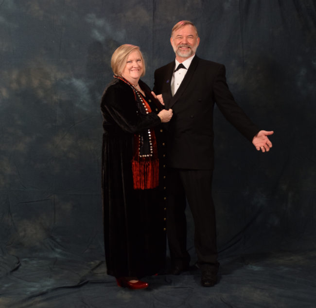 Lori and Virgil Fredenberg.  Virgil bought his tux from Alaskan Dames and Gents Consignment Shop. Lori's scarf is designed by Juneau's Stories and Legends Inc. (Photo by Skip Gray/KTOO)