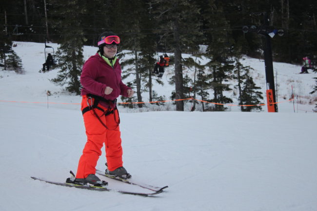 Jessica Gilbert, 30, has been skiing with ORCA for 15 years and continues to push herself to learn new skills. (Photo by Lisa Phu/KTOO)