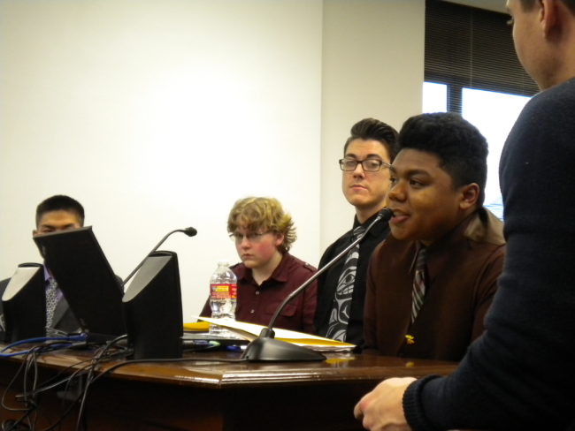 Benjamin Dahl-Rouzan shares his story of living in foster care before the House's Health and Social Services Committee on Tuesday. Dahl-Rouzan is a member of the Alaska Youth Policy Summit, which is a group that advocate changes to the state's social services. (Photo by Kevin Reagan/ KTOO)  