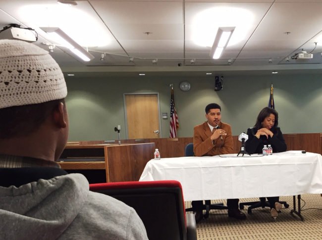 Dr. Allia Carter and author Omar Tyree speak about helping young men of color succeed. (Photo by Anne Hillman/KSKA)