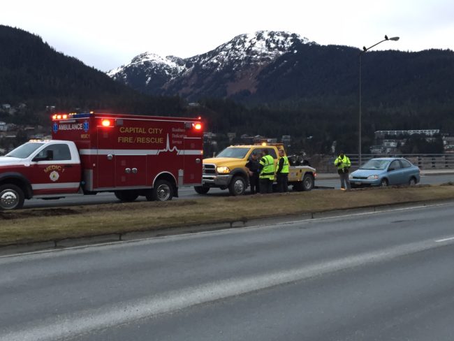 Capital City/Fire Rescue EMTs and JPD officers respond Tuesday afternoon to a vehicle-pedestrian collision on Egan Drive. (Photo by Lisa Phu/KTOO)