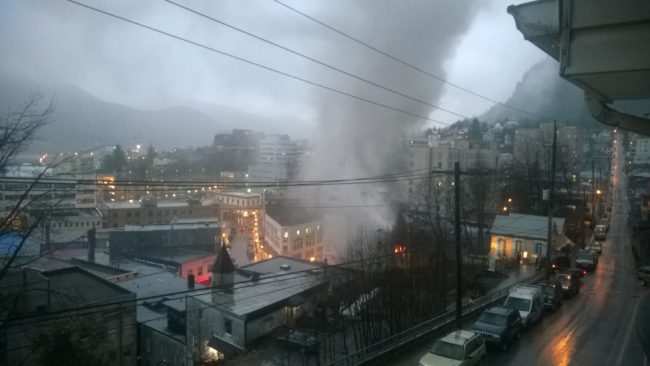 The Gastineau Apartments on fire on March 21, 2015. (Photo by Jeremy Hsieh/KTOO)