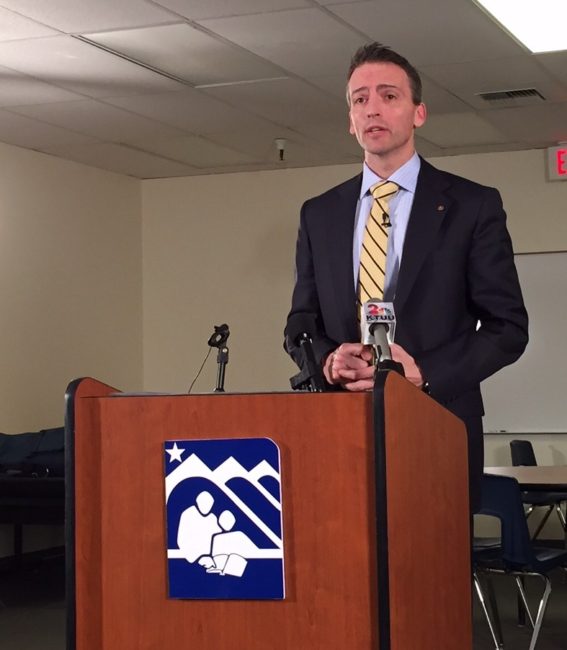 Superintendent Ed Graff speaking at a podium