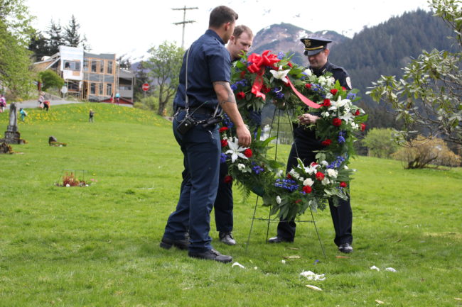 The Juneau Police Department places a wreath on the grave of Officer Richard Adair (photo by Elizabeth Jenkins/KTOO) 