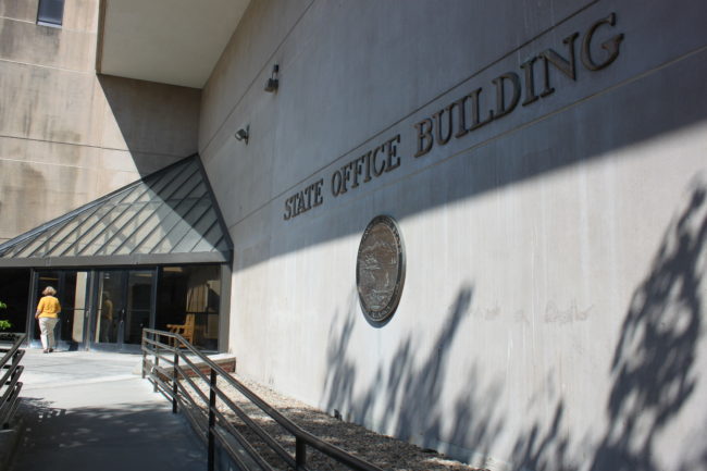 State workers react to the governor's email about potential layoffs. (Photo by Lisa Phu/KTOO)