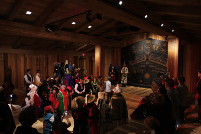 The inside of the clan house features a traditional small door to thwart invaders. (Photo by David Purdy/KTOO)