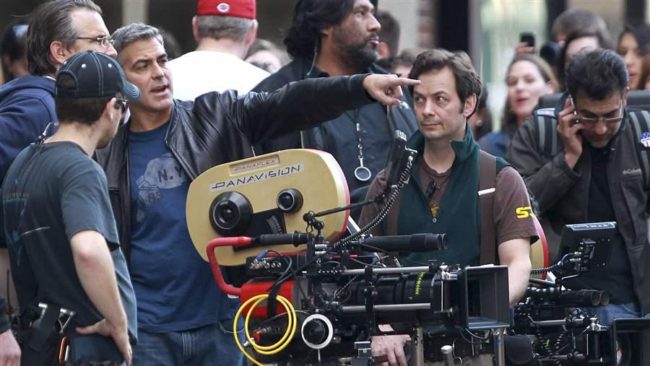 George Clooney plans a shot during the filming of a movie in Cincinnati. Ohio is one of 39 states that offer tax incentives to the film and television industries, but some states are beginning to reconsider whether they are worth the cost. (AP)