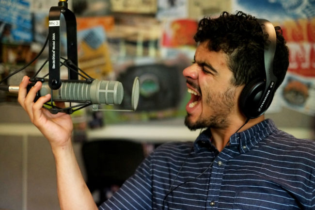 Musician Ryan Cortes of the Juneau band Gemini Waltz in the KXLL studio.