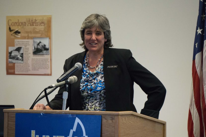 Office of Management and Budget Director Pat Pitney addresses the Juneau Chamber of Commerce, July 16, 2015.