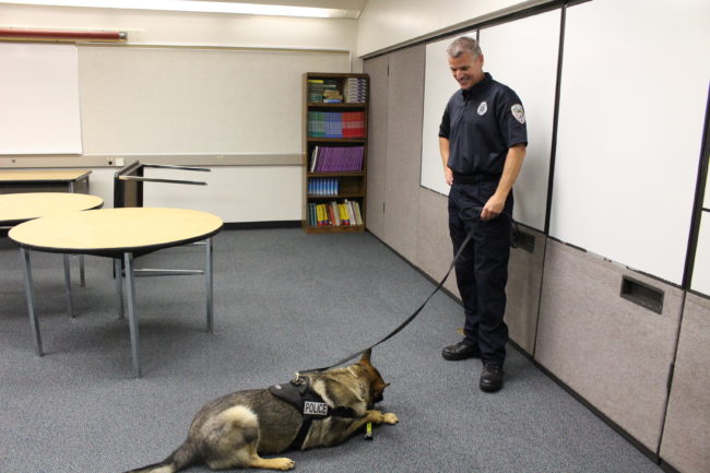 Buddy's "paycheck" is a piece of hose or PVC pipe. (Photo by Elizabeth Jenkins/KTOO) 