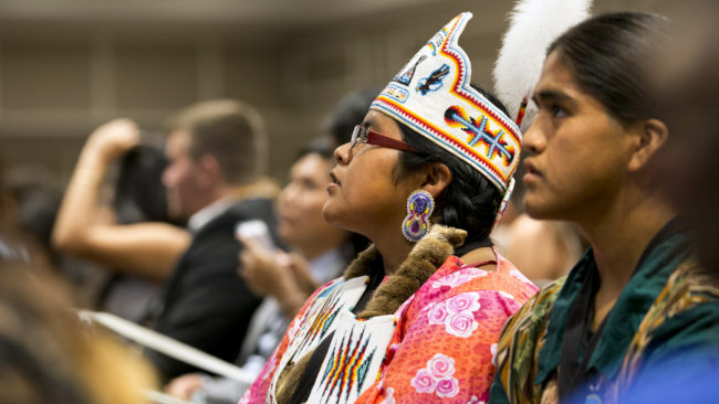 "I know that you may have moments in your lives when you're filled with doubts, or you feel weighed down by history ... But when you start to feel that way, I want you all to remember one simple but powerful truth -– that every single one of your lives is precious and sacred, and each of you was put on this earth for a reason," Michelle Obama said addressing the gathering. Jacquelyn Martin/AP