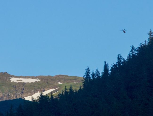 With Temsco Helicopeters, Alaska State Troopers performed an aerial search over Mt. Roberts Sunday evening. (Photo by Mikko Wilson/KTOO)