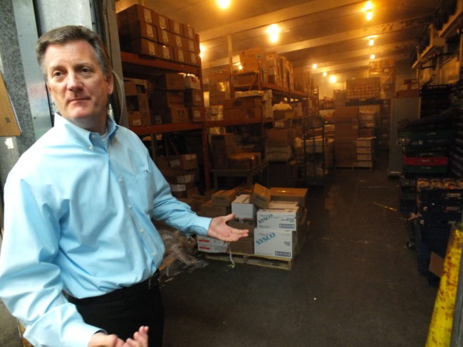 Tyler Myers says the Superbear IGA back room includes a walk-in freezer of approximately 2600 square feet. (Photo by Matt Miller/KTOO)