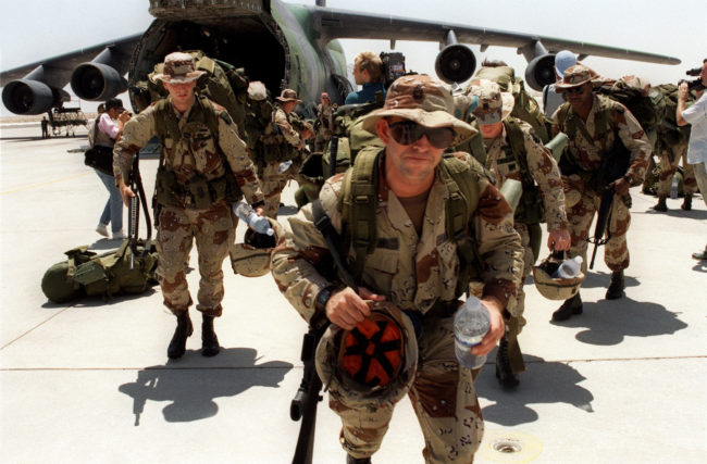 U.S. Marines arrive at Saudi Arabia's Dhahran Air Base on Aug. 21, 1990. The U.S. began a buildup in the region just days after Iraq invaded Kuwait on Aug. 2 of that year. The U.S. military has been active in Iraq virtually nonstop for the past quarter-century. Gerard Fouet/AFP/Getty Images