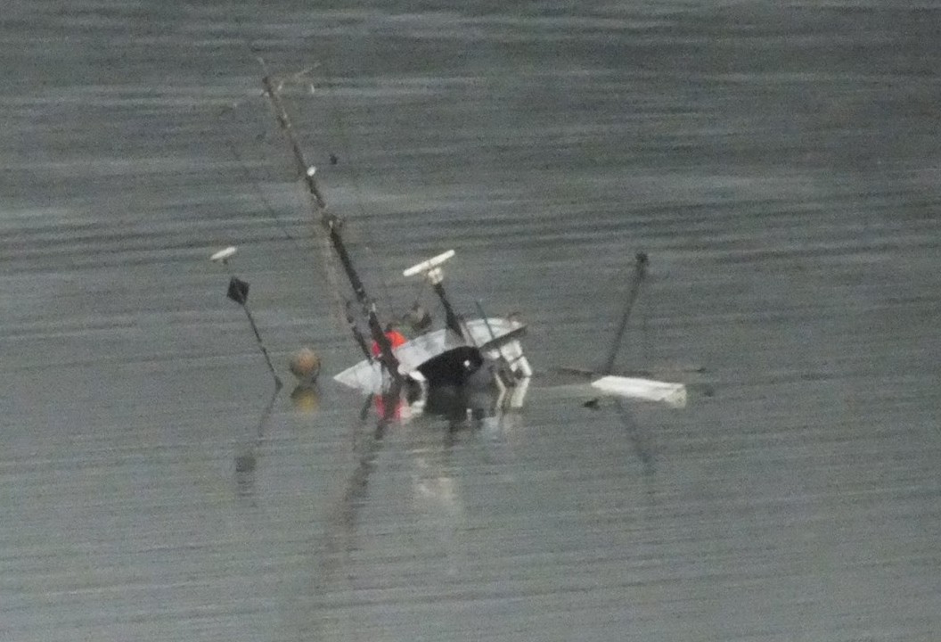 The top of the Challenger still protrudes above the water (Photo by Matt Miller/KTOO)