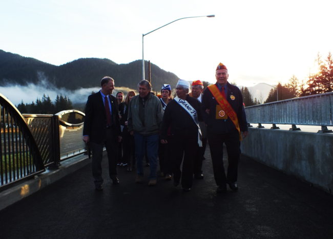 The procession makes their way across the new Brotherhood Bridge. (Photo by Matt Miller/KTOO)
