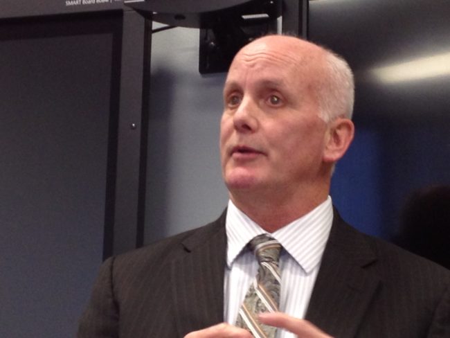 Alaska Education Commissioner Mike Hanley discusses the AMP results in Anchorage. (Photo by Ellen Lockyer/KSKA)
