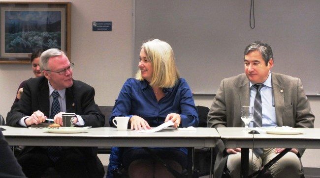 Juneau Reps. Cathy Muñoz, center, and Sam Kito, right, listed as Sen. Dennis Egan makes a point. (Photo by Casey Kelly/KTOO)