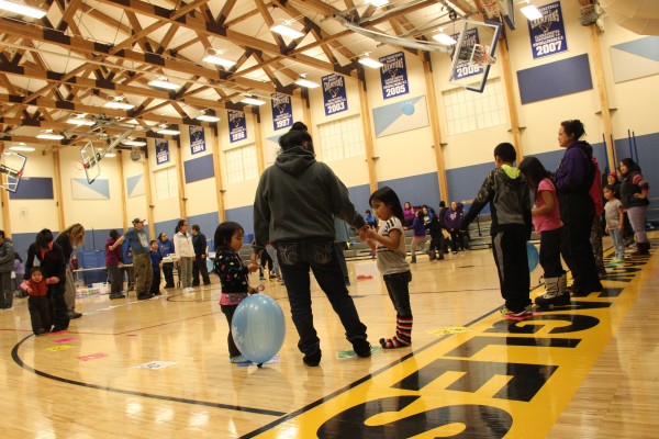 The cake walk during the Kwigillingok School’s senior carnival. The night of the carnival, the entire village was powered by wind. (Photo by Rachel Waldholz/APRN)