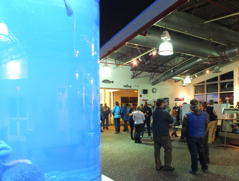 An open house for the proposed removal of the sunken tug Challenger was held at Douglas Island Pink and Chum facility on Tuesday. (Photo by Kelli Burkinshaw/KTOO)