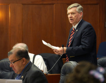 Sen. Charlie Huggins, R-Wasilla, discusses House Bill 75, the Marijuana use and regulation bill in the Alaska Senate, Feb. 24, 2016. He was explaining changes to the bill that were made in committee shortly before it passed the Senate. (Photo by Skip Gray/360 North).