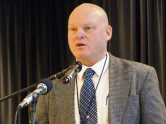 Alaska Marine Highway System Capt. Mike Neussl addresses the Southeast Conference Mid-Session Summit in Juneau on March 15, 2016.
