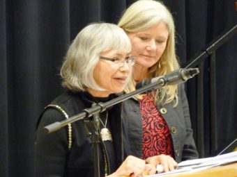 Central Council Director of Tribal Family and Youth Services speaks at a Wednesday signing ceremony as Health and Social Services Tribal Affairs Advisor Kristie Swanson listens. Both were key to reaching the agreement. (Photo by Ed Schoenfeld/CoastAlaska News)
