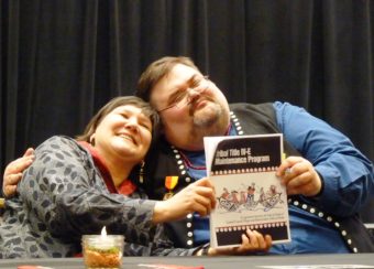 State Health and Social Services Commissioner Valarie Davidson and Tlingit-Haida Central Council President Richard Peterson embrace March 2 after signing an agreement transferring foster care and other programs for Southeast Native children to the council. (Photo by Ed Schoenfeld/CoastAlaska News)