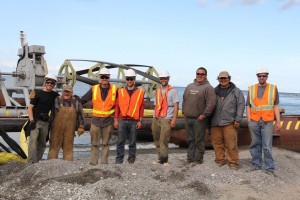 Local contractors and ORPC team members in front of RivGen. (Photo courtesy of ORPC)