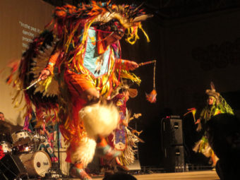 Dancers perform with Broken Walls. The group includes Alaska Natives and Native Americans from the Lower 48. (Photo by Laura Kraegel/KNOM)