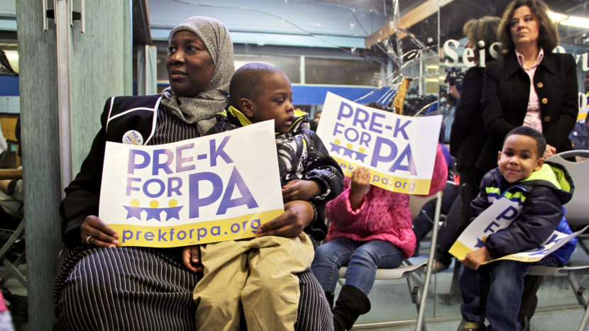Khadija Sabir of Lovie Lee's Stars of Tomorrow preschool in Philadelphia attends a soda tax rally with three of her charges. The proposed tax promises to pay for public preschools, parks and recreation centers. Emma Lee/WHYY