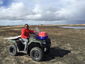 Lillian Kiunya on her four-wheeler at the edge of town in Kwigillingok. (Photo by Anne Hillman/KSKA)