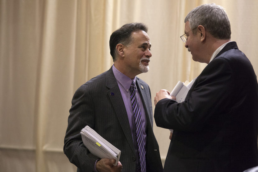 Sen. Peter Micciche, R-Soldotna, and Rep. Dan Saddler, R-Eagle River, talk after a Senate floor session on Wednesday, May 18, 2016, in Juneau, Alaska. (Photo by Rashah McChesney/KTOO)