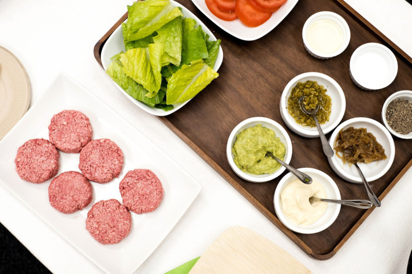 Silicon Valley-based Impossible Foods has taken a high-tech approach to creating a plant-based burger that smells and tastes like real meat. At the company's headquarters in Redwood City, Calif., chef Traci Des Jardins served the Impossible Burger (pictured uncooked) with vegan mayo, Dijon mustard, mashed avocado, caramelized onions, chopped cornichon, tomato and lettuce on a pretzel bun.