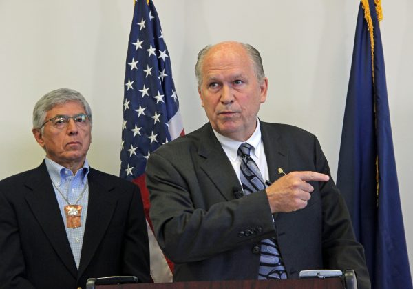 Gov. Bill Walker spoke to reporters on June 29, announcing $1.29 billion in budget vetos, including a $1,000 cap on the PFD. Photo: Rachel Waldholz/APRN