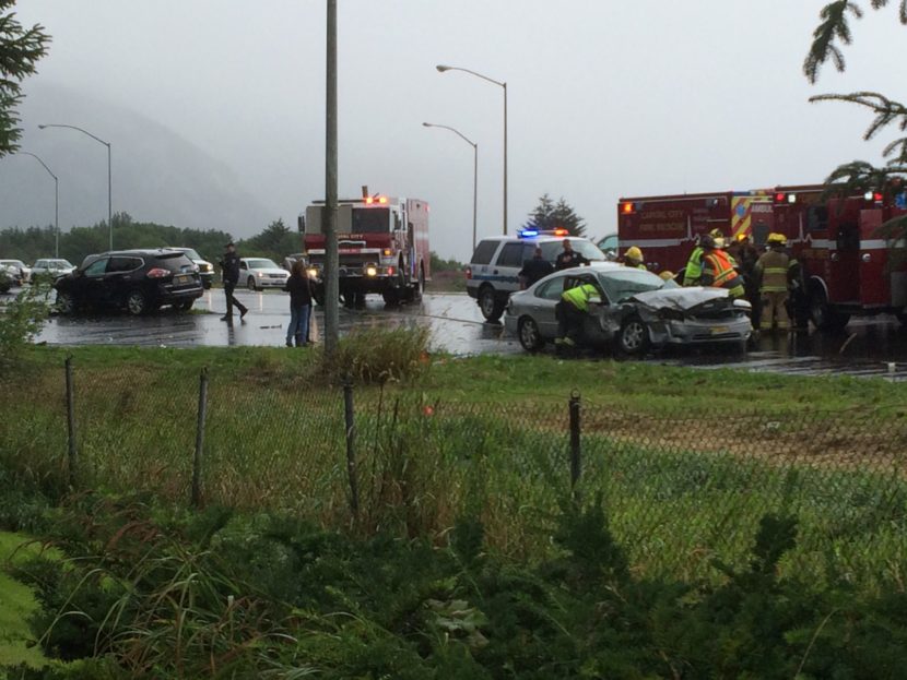 Authorities investigate a two-vehicle collision on Egan Drive Saturday, July 23, 2016. (Photo by Kelli Burshaw/KTOO)