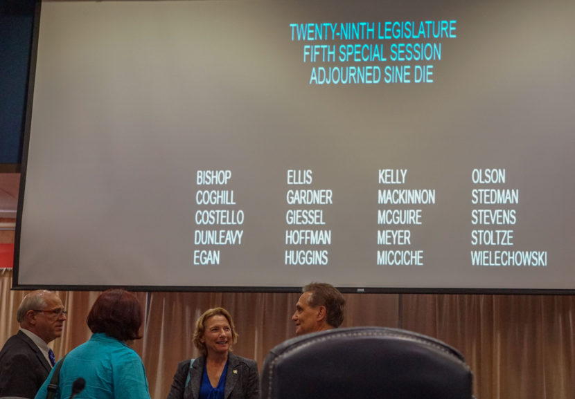 Sens. John Coghill, R-North Pole, Berta Gardner, D-Anchorage, Cathy Giessel, R-Anchorage, and Kevin Meyer, R-Anchorage, chat after adjourning sine die, July 18, 2016. (Photo by Jeremy Hsieh/KTOO)