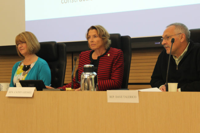 Lawmakers listened to testimony from Wood Mackenzie's David Barrowman at a joint hearing of the House and Senate Resources Committees on Aug. 24, 2016. From left: Sen. Anna MacKinnon, R-Eagle River; Sen. Cathy Giessel, R-Anchorage; and Rep. David Talerico, R-Healy. Photo: Rachel Waldholz, Alaska's Energy Desk