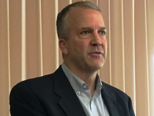 Sen Dan Sullivan, R-Alaska, speaks during a Ketchikan Chamber of Commerce lunch. (Photo by Leila Kheiry/KRBD)