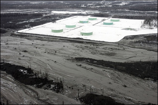 (Courtesy Photo/Peninsula Clarion) State regulators are monitoring two small spills at the Drift River Terminal Facility show here on March 24, 2009 where it sits about 22 miles from the summit of the Mount Redoubt volcano on the west side of Cook Inlet. The facility is operated by Hilcorp Alaska's Cook Inlet Pipe Line Company.