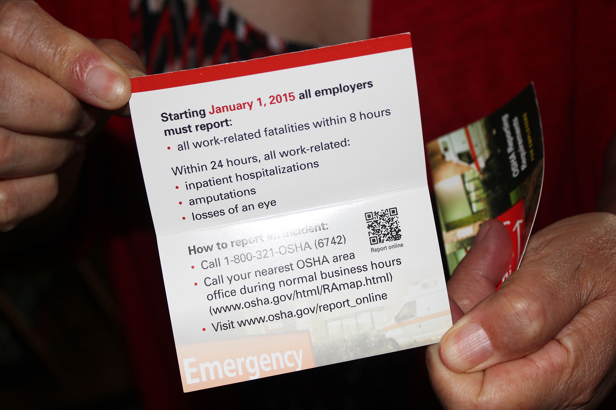 In 2015, federal regulators began requiring injuries to be reported within 24 hours. Nebraska Appleseed, a worker advocacy group, handed out these pamphlets to inform workers of the new rule. (Peggy Lowe, Harvest Public Media)