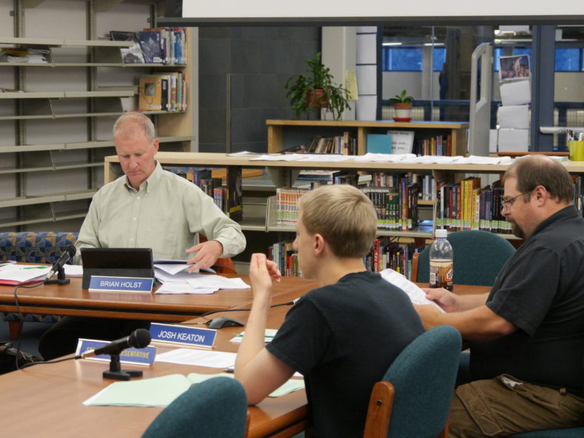 Brian Holst (left) is president of the Juneau School Board.