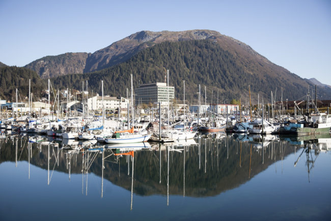 Boats lined up in Harris Harbor on a sunny, clear day Wednesday, Oct. 12, 2016 in downtown Juneau, Alaska. (Photo by Rashah McChesney/Alaska’s Energy Desk)