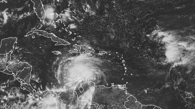A satellite image shows Hurricane Matthew's location around midday Saturday. The storm is expected to move to the north and northwest. NOAA